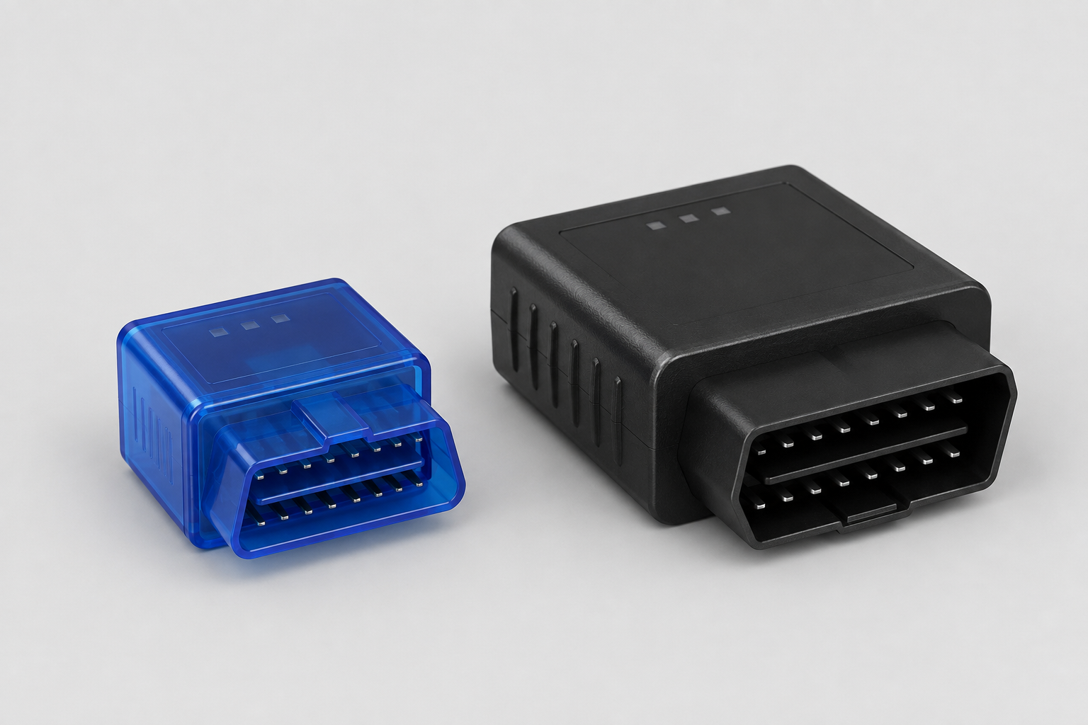 Illustration of generic blue and black ELM327-style OBD-II adapters
